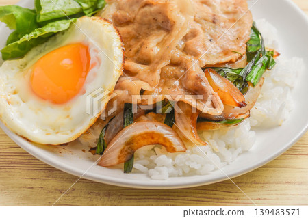 Pork and fried egg rice Pork and fried egg rice 139483571