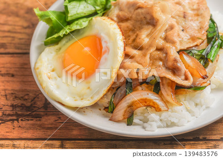 Pork and fried egg rice Pork and fried egg rice 139483576