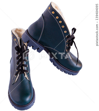 Pair of Green Leather Winter Boots isolated. Comfortable warm shoes Pair of Green Leather Winter Boots isolated. Comfortable warm shoes 139484095