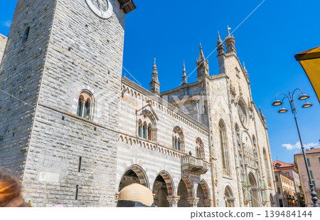 Old Church in Italy Como Cathedral Duomo Italian old temple in center. Santa Maria Assunta. Como city center house building architecture Old Church in Italy Como Cathedral Duomo Italian old temple in center. Santa Maria Assunta. Como city center house building architecture 139484144