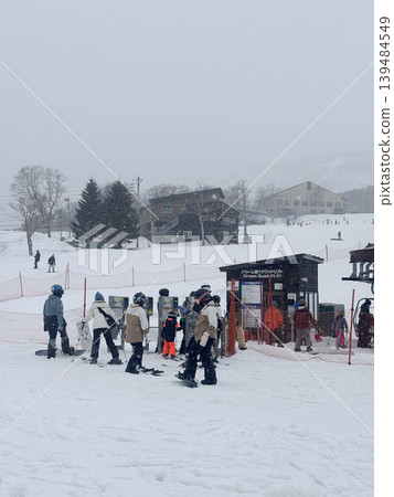 Niseko, Japan - April 3, 2025 : Snowboarders and skiers on the lower pistes of Niseko Hanazono ski resort at Niseko, Hokkaido,Japan on April 3, 2025. Niseko, Japan - April 3, 2025 : Snowboarders and skiers on the lower pistes of Niseko Hanazono ski resort at Niseko, Hokkaido,Japan on April 3, 2025. 139484549