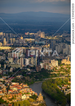 Panoramic aerial cityscape sunset view of Tbilisi, the capital of Georgia Panoramic aerial cityscape sunset view of Tbilisi, the capital of Georgia 139485009