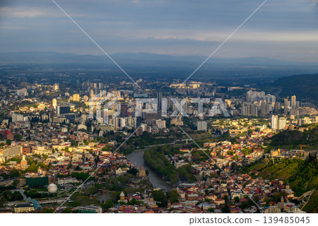 Panoramic aerial cityscape sunset view of Tbilisi, the capital of Georgia Panoramic aerial cityscape sunset view of Tbilisi, the capital of Georgia 139485045
