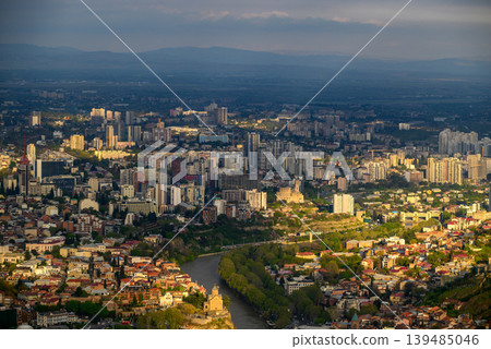 Panoramic aerial cityscape sunset view of Tbilisi, the capital of Georgia Panoramic aerial cityscape sunset view of Tbilisi, the capital of Georgia 139485046