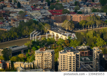 Panoramic aerial cityscape sunset view of Tbilisi, the capital of Georgia Panoramic aerial cityscape sunset view of Tbilisi, the capital of Georgia 139485053