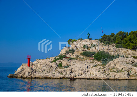 Statute of St. Peter at the entrance to Makarska bay in Makarska, Croatia Statute of St. Peter at the entrance to Makarska bay in Makarska, Croatia 139485492
