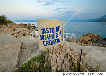 Taste of summer in Croatia beach bathing suit changing cabin on rocky coast in Makarska Taste of summer in Croatia beach bathing suit changing cabin on rocky coast in Makarska 139485581