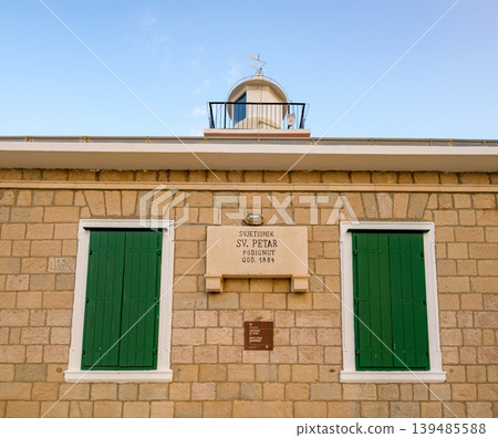 Stone St. Peter lighthouse on Adriatic sea in Makarska riviera in Croatia Stone St. Peter lighthouse on Adriatic sea in Makarska riviera in Croatia 139485588