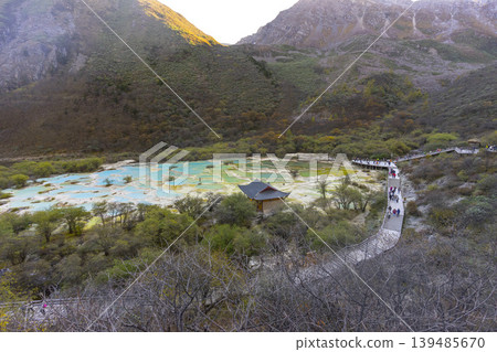 Beautiful view of Multi-Colored Pool in Huanglong National Park, famous for its colorful pools formed by calcite deposits in Sichuan, China. Beautiful view of Multi-Colored Pool in Huanglong National Park, famous for its colorful pools formed by calcite deposits in Sichuan, China. 139485670
