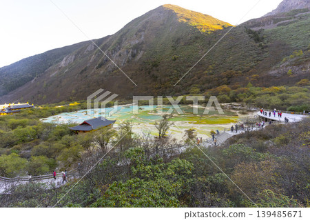 Beautiful view of Multi-Colored Pool in Huanglong National Park, famous for its colorful pools formed by calcite deposits in Sichuan, China. Beautiful view of Multi-Colored Pool in Huanglong National Park, famous for its colorful pools formed by calcite deposits in Sichuan, China. 139485671