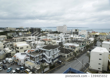 Miyako Island city area on the Hirara Port side under cloudy skies 139485832