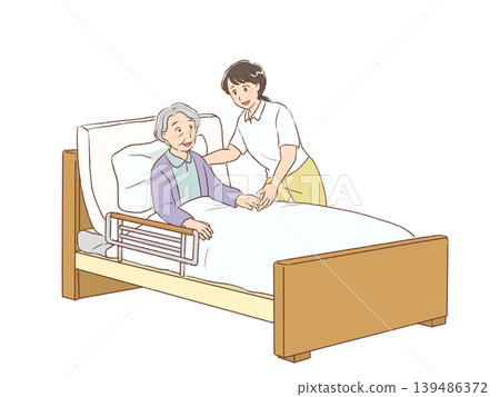A female caregiver assists an elderly woman in getting up. A female caregiver assists an elderly woman in getting up. 139486372