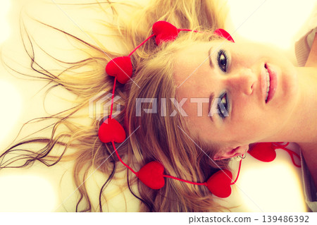 Girl with little red hearts. Girl with little red hearts. 139486392
