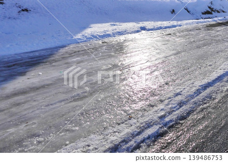 Freezing road surface 139486753