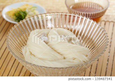 A classic Japanese summer noodle dish: cold somen noodles A classic Japanese summer noodle dish: cold somen noodles 139487341