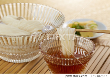 A classic Japanese summer noodle dish: cold somen noodles A classic Japanese summer noodle dish: cold somen noodles 139487363