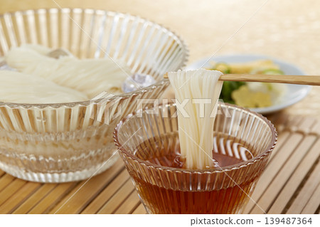 A classic Japanese summer noodle dish: cold somen noodles A classic Japanese summer noodle dish: cold somen noodles 139487364