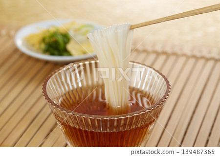 A classic Japanese summer noodle dish: cold somen noodles A classic Japanese summer noodle dish: cold somen noodles 139487365