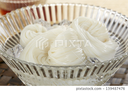 A classic Japanese summer noodle dish: cold somen noodles A classic Japanese summer noodle dish: cold somen noodles 139487476