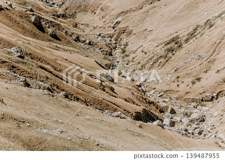 Landscape of Dagestan mountains, mountain range in haze summer Russia Landscape of Dagestan mountains, mountain range in haze summer Russia 139487955