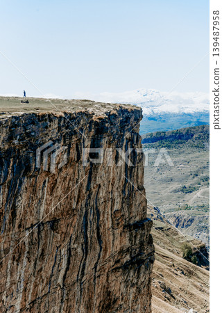 Landscape of Dagestan mountains, mountain range in haze summer Russia 139487958