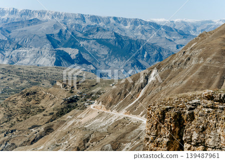 Landscape of Dagestan mountains, mountain range in haze summer Russia 139487961