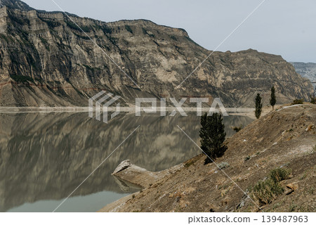 Landscape of Dagestan mountains, mountain range in haze summer Russia Landscape of Dagestan mountains, mountain range in haze summer Russia 139487963