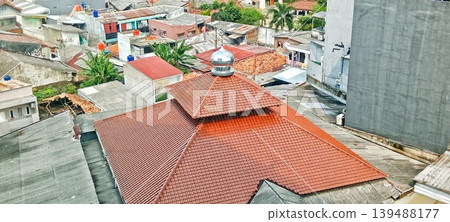 Mosque dome amidst a densely populated village Mosque dome amidst a densely populated village 139488177
