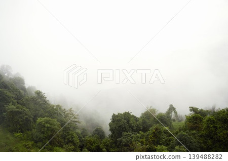The mist-shrouded mountain scenery as seen from the Annapurna Trail 139488282