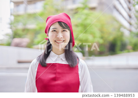 A young lady who had an apron A young lady who had an apron 139488953