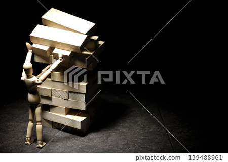 A collapsing balance game and a drawing mannequin A collapsing balance game and a drawing mannequin 139488961
