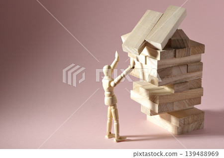 A collapsing balance game and a drawing mannequin A collapsing balance game and a drawing mannequin 139488969