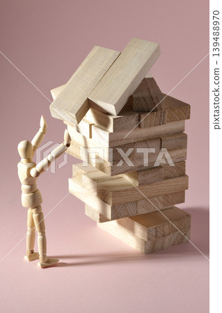 A collapsing balance game and a drawing mannequin A collapsing balance game and a drawing mannequin 139488970