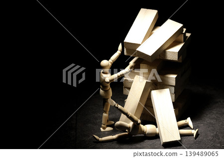 A collapsing balance game and a drawing mannequin A collapsing balance game and a drawing mannequin 139489065