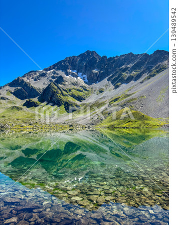 Alpine Jovet lakes with clear reflection in Les Contamines-Montjoie, France 139489542