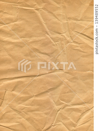 Crumpled brown lined paper texture 139489552