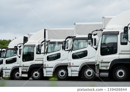 Trucks lined up in the garage Trucks lined up in the garage 139489844
