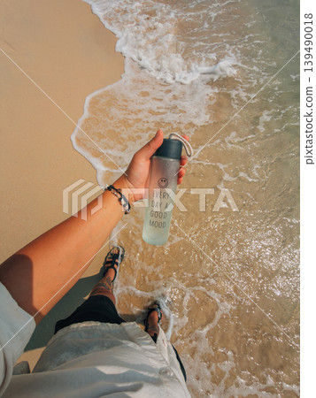 Walking on Shore with Water Bottle POV Walking on Shore with Water Bottle POV 139490018