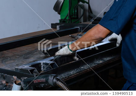 worker's hands on working table worker's hands on working table 139490513