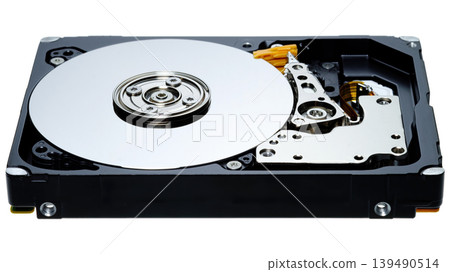 a computer's hard disk HDD data storage drive without a shield isolated  in a white background shows magnetic disc and electronic parts inside 139490514