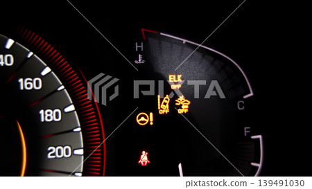 Car dashboard. Modern digital car dashboard with illuminated speedometer warning icons fuel gauge driver assistance and other indicators. Advanced automotive instrument cluster tech in future vehicle Car dashboard. Modern digital car dashboard with illuminated speedometer warning icons fuel gauge driver assistance and other indicators. Advanced automotive instrument cluster tech in future vehicle 139491030