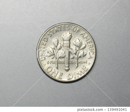 A 10-cent coin issued in the United States in 1964. A 10-cent coin issued in the United States in 1964. 139491041