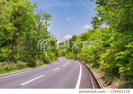 A road winding through the mountains of the Okubiwako region, Nishi-Asai-cho, Nagahama City, Shiga Prefecture A road winding through the mountains of the Okubiwako region, Nishi-Asai-cho, Nagahama City, Shiga Prefecture 139491159