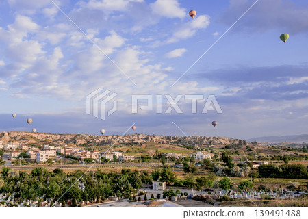 Air balloon flight early morning dawn cloudy sky mountain rock Cappadocia Turkey Air balloon flight early morning dawn cloudy sky mountain rock Cappadocia Turkey 139491488