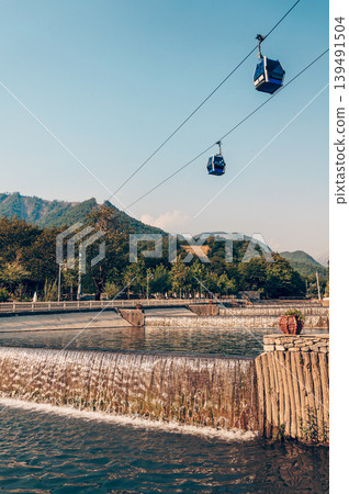 Ski resort view of ski track with cable car summer, Tufandag, Tfan, Azerbaijan Ski resort view of ski track with cable car summer, Tufandag, Tfan, Azerbaijan 139491504
