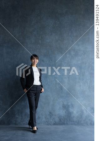 A businesswoman wearing a pantsuit A businesswoman wearing a pantsuit 139491524