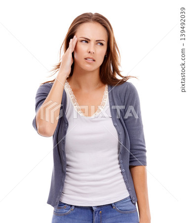 Woman, headache and thinking in studio of stress, challenge of debt and risk of mental health on white background. Frustrated, confused and sad model with anxiety, brain fog and doubt wrong mistake Woman, headache and thinking in studio of stress, challenge of debt and risk of mental health on white background. Frustrated, confused and sad model with anxiety, brain fog and doubt wrong mistake 139492039