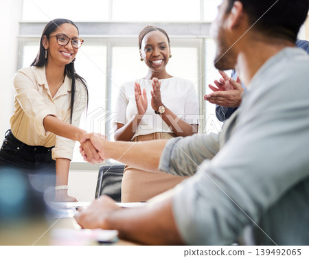 Applause, handshake and business people in office with smile, collaboration and deal for advertising. Happy, team and shaking hands in creative agency with agreement, clap and marketing partnership. 139492065