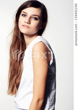 Portrait, beauty and hair with a natural woman in studio on a white background for cosmetic wellness. Skincare, haircare and a confident young person at the salon for shampoo or keratin treatment Portrait, beauty and hair with a natural woman in studio on a white background for cosmetic wellness. Skincare, haircare and a confident young person at the salon for shampoo or keratin treatment 139492298