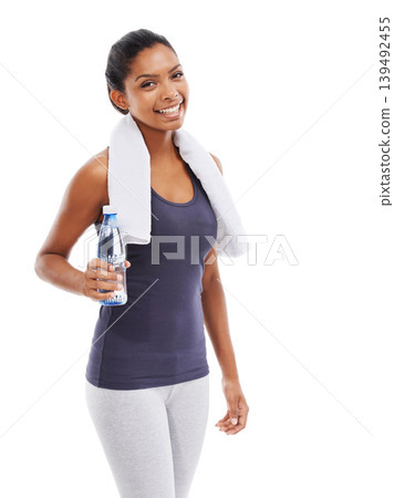 Woman, liquid and smile in portrait for fitness, studio and water for health and wellness. Athlete, female person and pride on face for hydration, weight loss and detox or thirst by white background Woman, liquid and smile in portrait for fitness, studio and water for health and wellness. Athlete, female person and pride on face for hydration, weight loss and detox or thirst by white background 139492455